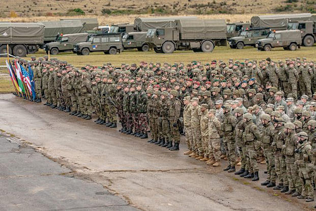 Troops from the U.S. Army, Armed Forces of the Slovak Republic, Czech Army, Polish Armed Forces and Hungarian Defense Forces stand in formation during the Slovak Shield 2016 opening ceremony Oct. 6, 2016, in the Slovak Republic. Courtesy photo