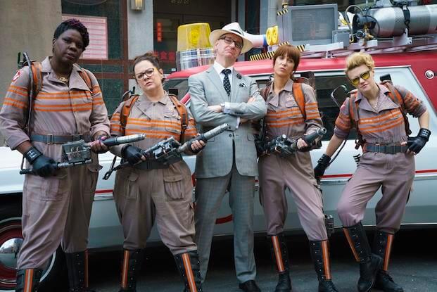 Director Paul Feig poses with the Ghostbusters in front of the Ecto-1. Patty Tolan (Leslie Jones), Abby Yates (Melissa McCarthy), Erin Gilbert (Kristen Wiig) and Jillian Holtzmann (Kate McKinnon) on the set of Columbia Pictures' GHOSTBUSTERS.