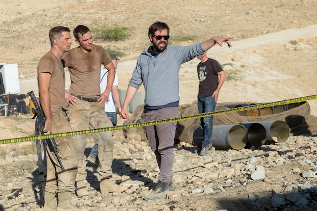 Logan Marshall-Green, Nicholas Hoult and director Fernando Coimbra on the set of Sand Castle (photo courtesy Netflix).