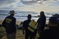 Rescue team searches for Samuel Wanjiru at a beach in Puerto Rico