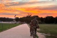 National Guard troops patrol the National Monument in Washington, D.C., as their deployment is extended through November. Photo by Bridget Craig National Guard troops patrol the National Monument in Washington, D.C., as their deployment is extended through November. Photo by Bridget Craig