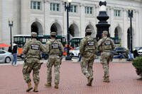 National Guard soldiers patrol at Union Station, Tuesday, Oct. 28, 2025, in Washington. (AP Photo/Rahmat Gul) DC Federal Intervention