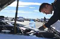 Tech. Sgt. Gabriel, a 432nd Wing/432nd Air Expeditionary Wing MQ-9 Reaper sensor operator, inspects his Mitsubishi Lancer Evolution at the Spring Mountain Raceway Nov. 1, 2015, in Pahrump, Nevada.  (U.S. Air Force/A1C Christian Clausen)