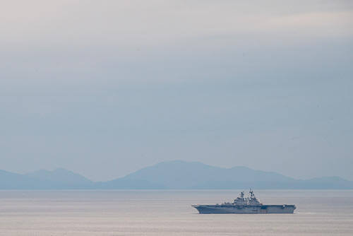 The USS America (LHA 6) sails into formation during Exercise Iron Fist in Sasebo Japan.