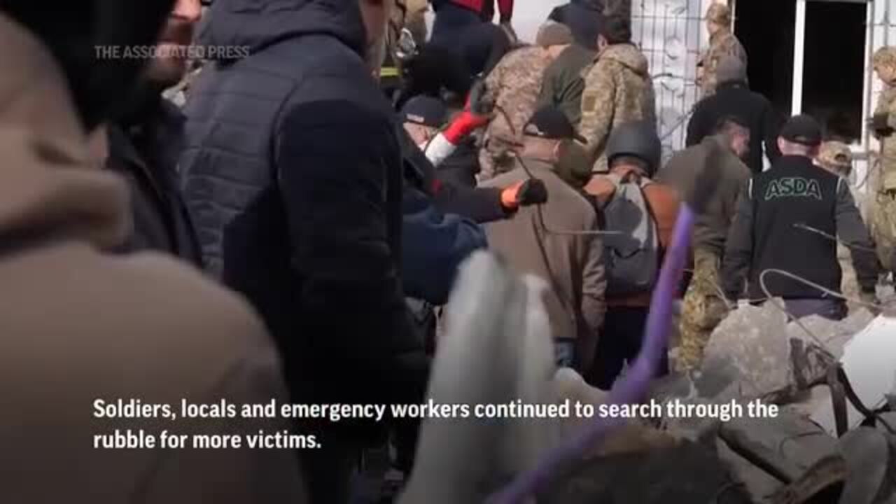 Ukrainian Rescuers Take Action After Russian Attacks