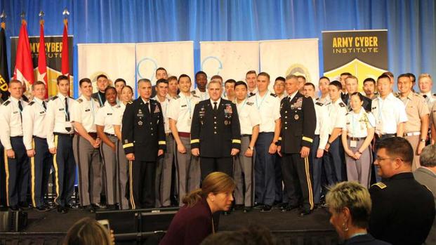 Gen. Mark Milley stands with audience members -- cadets, lieutenants and captains associated with the cyber force -- at the 2017 International Conference on Cyber Conflict U.S. (US Army/Steven Stover)