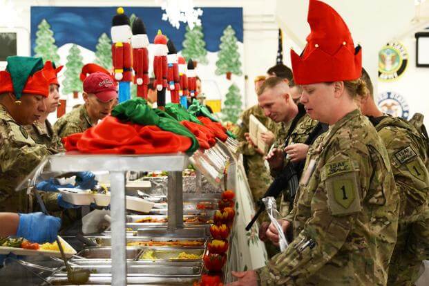 FILE -- Soldiers deployed to are served Christmas dinner from their command group at Bagram Airfield, Dec. 25, 2012. (U.S. Army/Staff Sgt. David J. Overson)