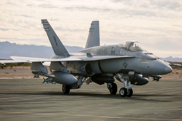 A U.S. Marine Corps F/A-18C Hornet assigned to Marine Fighter Attack Squadron 115 before takeoff during Integrated Training Exercise (ITX) 1-18 aboard Marine Corps Air Ground Combat Center, Twentynine Palms, Calif., Nov. 5, 2017. (U.S. Marine Corps photo/Staff Sgt. Kowshon Ye)