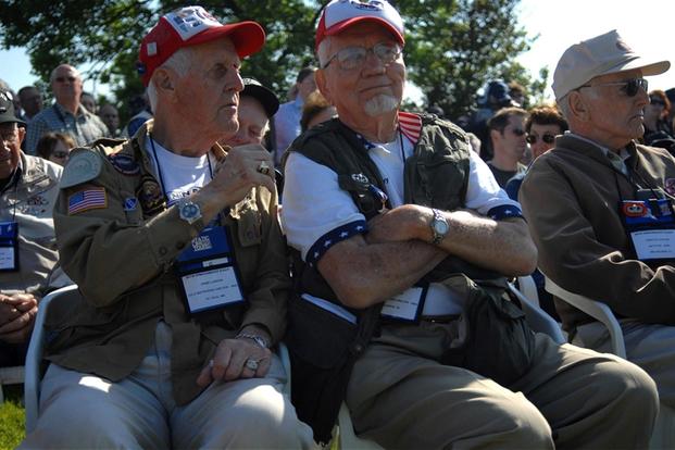 World War II veterans take part in a ceremony in Amfreville, France June 5, 2011 (DoD/Tech Sgt. Michael Voss)
