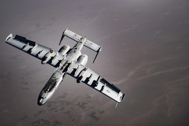 A U.S. Air Force A-10 Thunderbolt II pilot breaks right and releases flares over Afghanistan after completing aerial refueling operations with a KC-135 Stratotanker in support of Operation Freedom's Sentinel, March 12, 2018. (U.S. Air Force/Tech. Sgt. Gregory Brook)