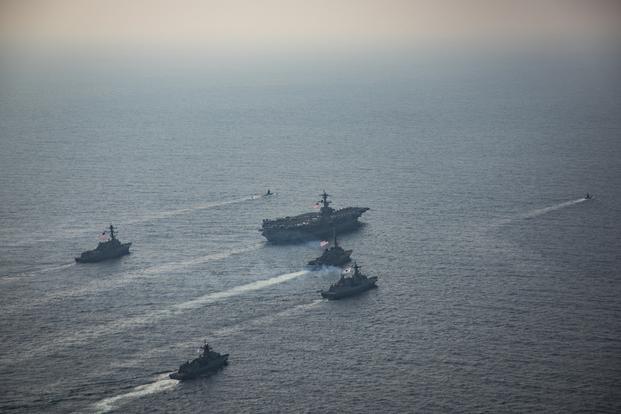 United States and the Republic of Korea Navy vessels participate in a photo exercise during Exercise Foal Eagle. The Carl Vinson Carrier Strike Group is on a western Pacific deployment as part of the U.S. Pacific Fleet-led initiative to extend the command and control functions of U.S. 3rd Fleet. (Z.A. Landers/U.S. Navy)