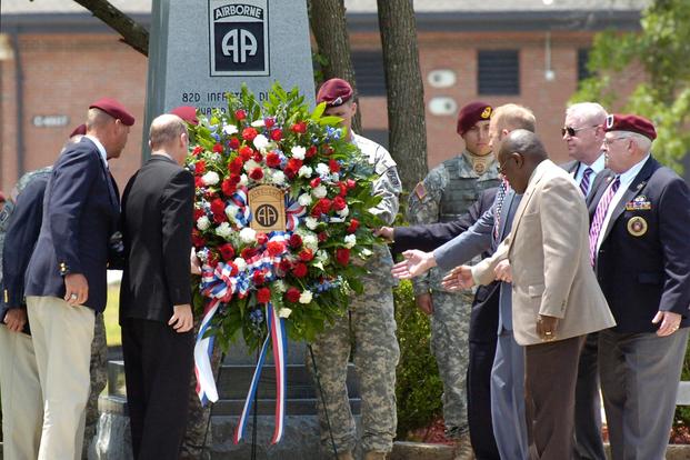Past and present Paratroopers from the 82nd Airborne Division, representing every conflict the division fought in, present a wreath at the division's annual memorial ceremony. (US Army/Staff Sgt. Andrew T. Alfano, 82nd)