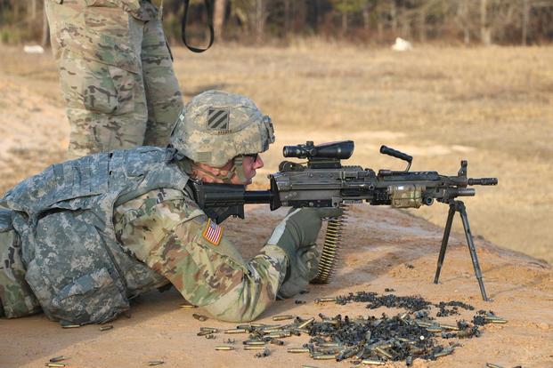 Pfc. Tyler Kramer, a mechanic with I Company, 3rd Combined Arms Battalion, 15th Infantry Regiment, 2nd Armored Brigade Combat Team, 3rd Infantry Division qualifies on an M249 Squad Automatic Weapon during a range Feb. 1, 2018 at Fort Stewart, Ga. (U.S. Army/Sgt. Ian Thompson)