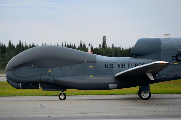 An RQ-4 Global Hawk, assigned to the 12th Reconnaissance Squadron, makes a first ever appearance during Red Flag Alaska 18-3, Aug. 16, 2018, at Eielson Air Force Base, Alaska. (U.S. Air Force photo/Tristan D. Viglianco)