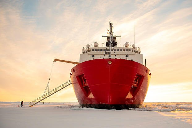 The U.S. Coast Guard cutter Healy sits in the ice about 715 miles north of Barrow, Alaska, Sept. 30, 2018, during an Arctic research mission. (Coast Guard photo by Senior Chief Petty Officer NyxoLyno Cangemi)