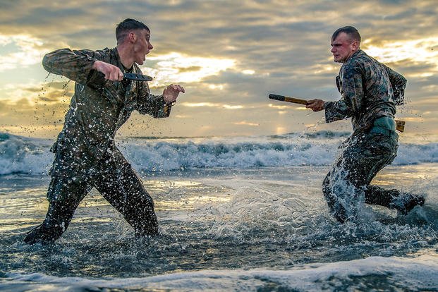 Marine Corps Cpls. Matthew Teutsch and Brett Norman participate in hand-to-hand and close-quarters combat training at Camp Pendleton, Calif., Oct. 2, 2018. Marine Corps photo by  Staff Sgt. Donald Holbert