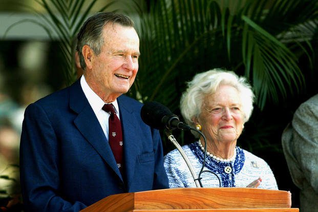  April 21, 2003: Former President  George H.W. Bush and former first lady Barbara Bush attend a portrait unveiling at the George H.W. Bush Library in College Station, Texas. (Photo by Joe Mitchell/Getty Images)