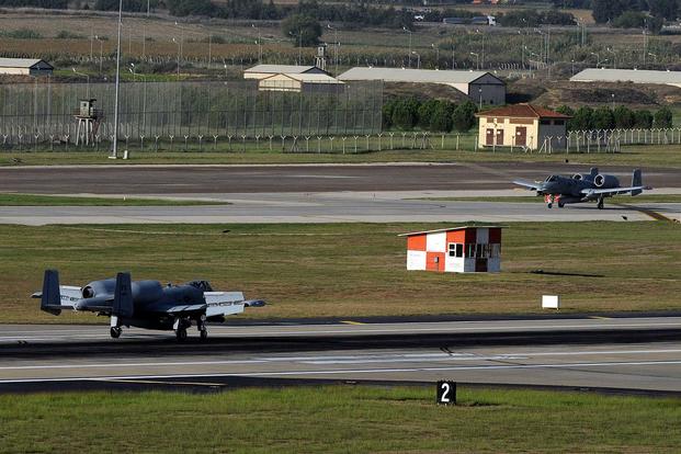 Two A-10C Thunderbolt II attack aircraft taxi down the flight line after landing at Incirlik Air Base, Turkey, on Oct. 15, 2015. (U.S. Air Force photo by Airman 1st Class Daniel Lile)