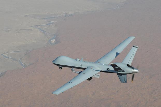An MQ-9 Reaper armed with GBU-12 Paveway II laser guided munitions and AGM-114 Hellfire missiles. (U.S. Air Force Photo/Lt. Col. Leslie Pratt)