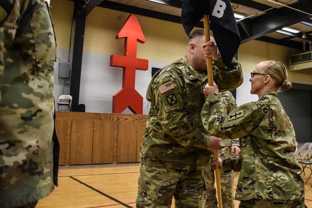 Capt. Amie Kemppainen takes command of Company B, 3rd Battlion, 126th Infantry at a ceremony at the Grand Valley Armory in Wyoming, Michigan Saturday, March 2nd, 2019. (U.S. Army/Lt. Col. John Hall)