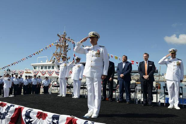 Adm. Karl Schultz, Coast Guard commandant, salutes during the commissioning of Coast Guard Cutter Terrell Horne at Coast Guard Base Los Angeles-Long Beach, March 22, 2019. (U.S. Coast Guard/Petty Officer 2nd Class Cory J. Mendenhall)