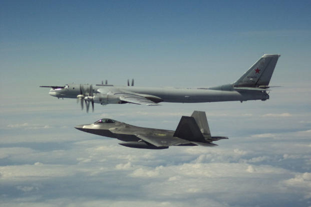 Two pairs of F-22 fighter jets, each with an E-3 intercepted Tu-95 bombers Su-35 fighter jets entering the Alaskan ADIZ May 21, 2019. (Photo: NORAD via Twitter)