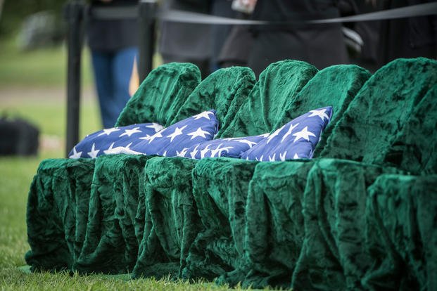 Flags sit on chairs at a memorial service in Arlington National Cemetery's Section 60. (Elizabeth Fraser/U.S Army)