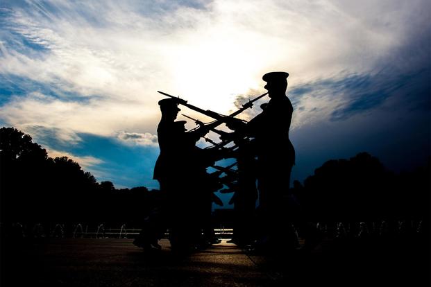 The U.S. Marine Corps Slient Drill Platoon Performs in front of the Historic World War II Memorial.  (U.S. Marne Corps/ Staff Sgt. Oscar L Olive IV)