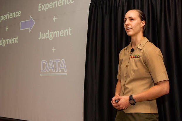 Marine Corps Capt. Courtney Thompson presents the details of her thesis during the latest Big Ideas Exchange, May 16, 2019. (Courtesy of Naval Postgraduate School)