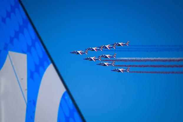 The Patrouille de France air demonstration team performs a flyby to signify the official start of the Paris Air Show June 19, 2017 at Le Bourget, France. Held every year, the Paris Air Show represents a unique opportunity for the United States to showcase its leadership in aerospace technologies. (Ryan Crane/U.S. Air Force)