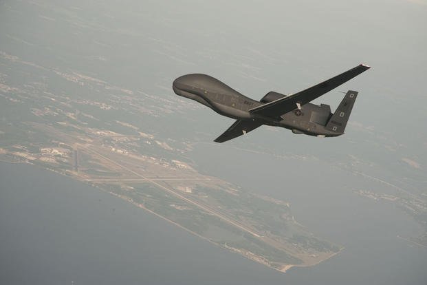 In this undated file photo provided by Northrop Grumman, a RQ-4 Global Hawk unmanned aerial vehicle conducts tests over Naval Air Station Patuxent River, Md. (U.S. Navy photo/Erik Hildebrandt courtesy Northrop Grumman)