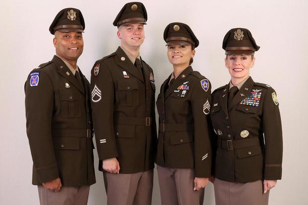Soldiers models the new Army Green Service Uniform that is scheduled to replace the blue Army Service Uniform for everyday wear by 2028. (U.S. Army)
