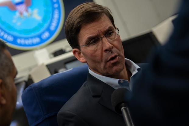 Acting U.S. Secretary of Defense Mark T. Esper speaks to reporters on a government aircraft en route to Brussels, Belgium, June 25, 2019. (DoD photo by Lisa Ferdinando) 