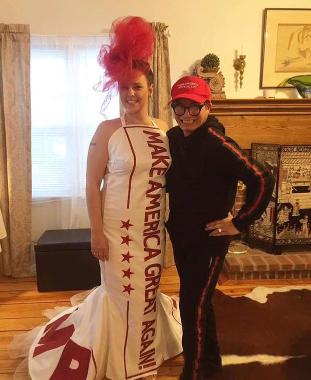 Bride Audra Johnson poses with Andre Soriano, who designed her “Make America Great Again” wedding dress. Johnson married a Marine Iraq War veteran. (Courtesy Jeff Johnson)