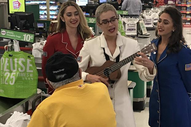 A USO Show Troupe serenades World War II veteran Bartolomeo "Benny" Ficeto, aka "Benny the Bagger," for his 98th birthday Aug. 20, 2019, at his local Stop & Shop, where he still works two shifts a week. Photo courtesy of Stop & Shop
