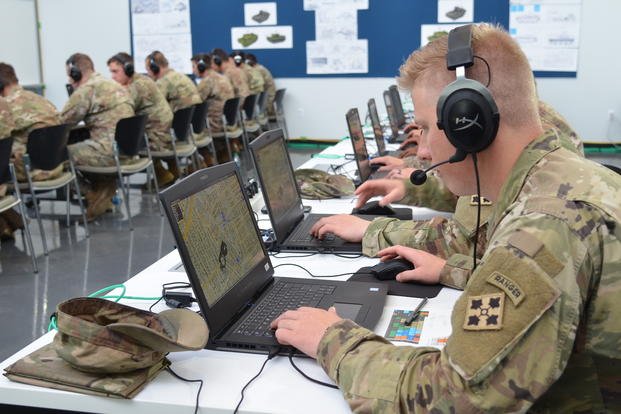 Soldiers support the Army's Ground Vehicle Systems Center Virtual Experiment #3 to help inform the Next Generation Combat Vehicle Cross Functional Team's campaign of learning for Manned and Un-Manned Teaming.