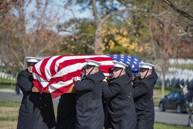 Body bearers from the Marine Barracks, Washington, D.C. (8th and I), help conduct military funeral honors with funeral escort for Col. Werner Frederick Rebstock in Section 12 of Arlington National Cemetery on Nov. 13, 2019. (U.S. Army photo by Elizabeth Fraser/Arlington National Cemetery)