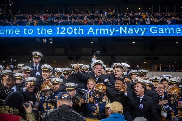 U.S. Naval Academy midshipmen celebrate the Navy’s victory during the 120th Army-Navy football game, Dec. 14, 2019. 