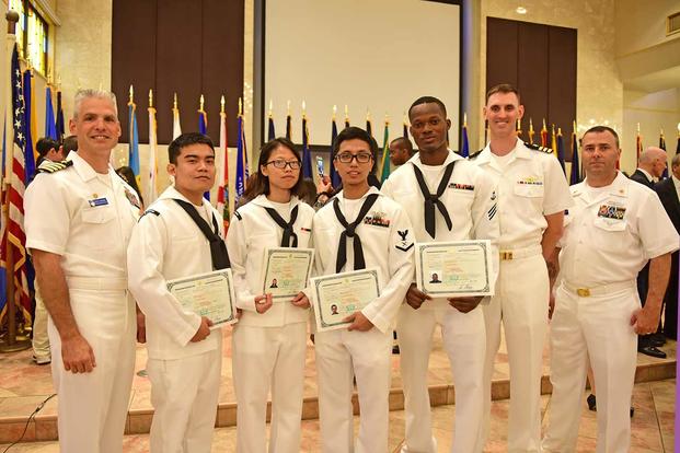 A group photo shows USS Blue Ridge Sailors who participated in a naturalization ceremony at the Chapel of Hope in Yokosuka, Japan. (U.S. Navy/Mass Communication Specialist Seaman Timothy D. Hale)