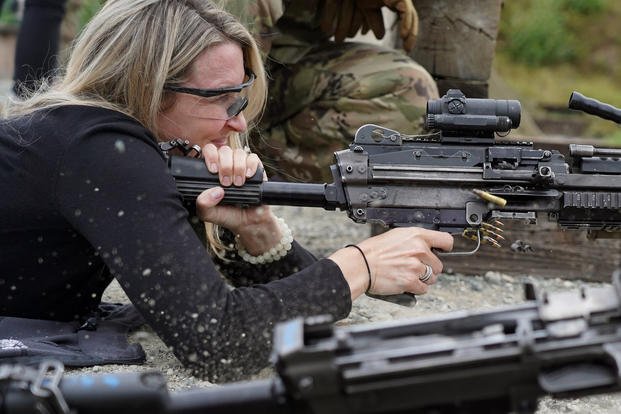 Military spouse fires squad automatic weapon on range