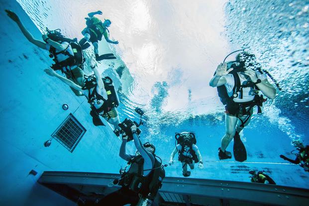 Students at Naval Diving and Salvage Training Center conduct training operations.