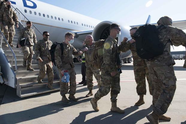 Members of 1st Battalion 178th Infantry Regiment, of the Illinois National Guard return home April 19, 2020