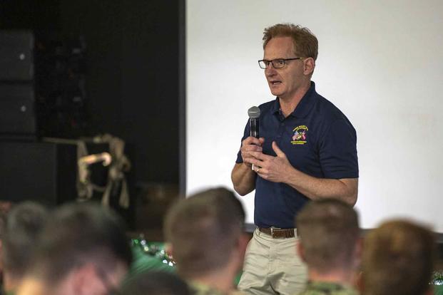 FILE PHOTO --Under Secretary of the Navy Thomas B. Modly speaks with Sailors and Marines assigned to Camp Lemonnier and Combined Joint Task Force-Horn of Africa at an All-Hands Call during his visit to the base.