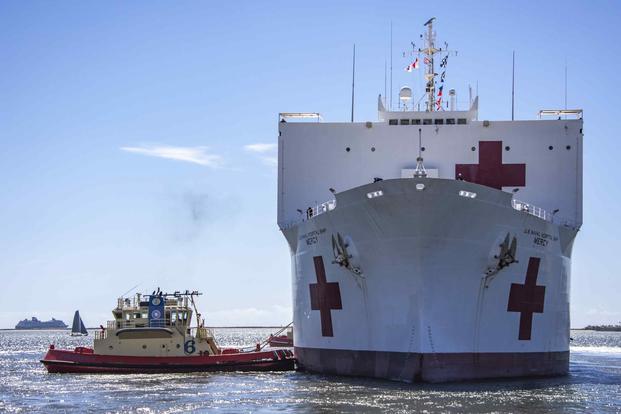 Military Sealift Command hospital ship USNS Mercy departs San Diego.