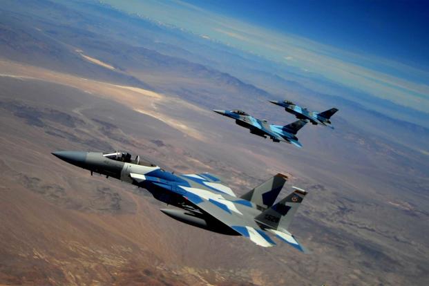 A U.S. Air Force F-15C and two F-16s.