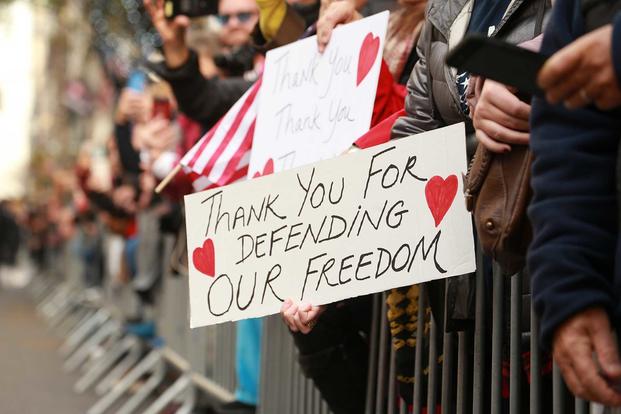 Supporters attend the Veterans Day Parade in New York, New York.