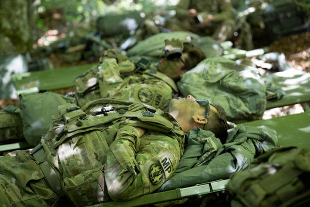 Military Police soldiers nap