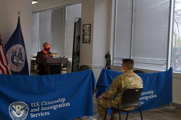 U.S. Army Spc. Jun Cho  gains his citizenship in Washington, D.C. in 2021. 