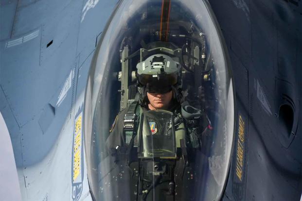 An F-16 Viper Demonstration Team pilot refuels with a KC-135 Stratotanker.