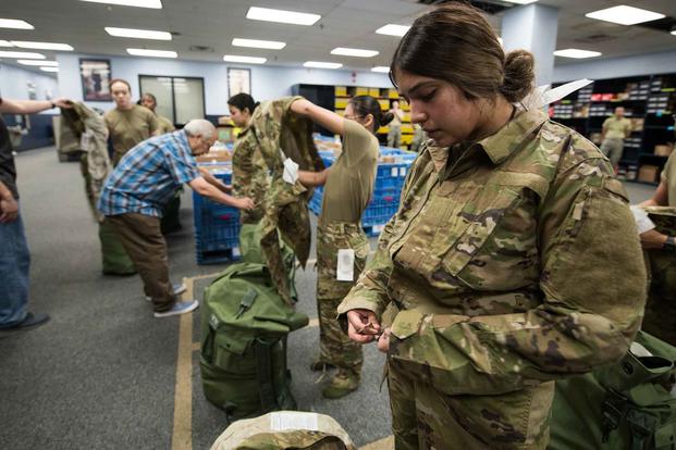 U.S. Air Force operational camouflage pattern (OCP) uniforms.